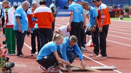 Reparaturarbeiten am Absprungbrett im Amsterdamer Olympiastadion ©  imago/Pressefoto Baumann
